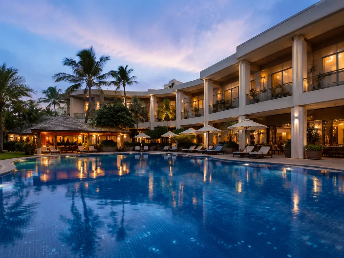 Hotel swimming pool at dusk with treated and monitored pool water